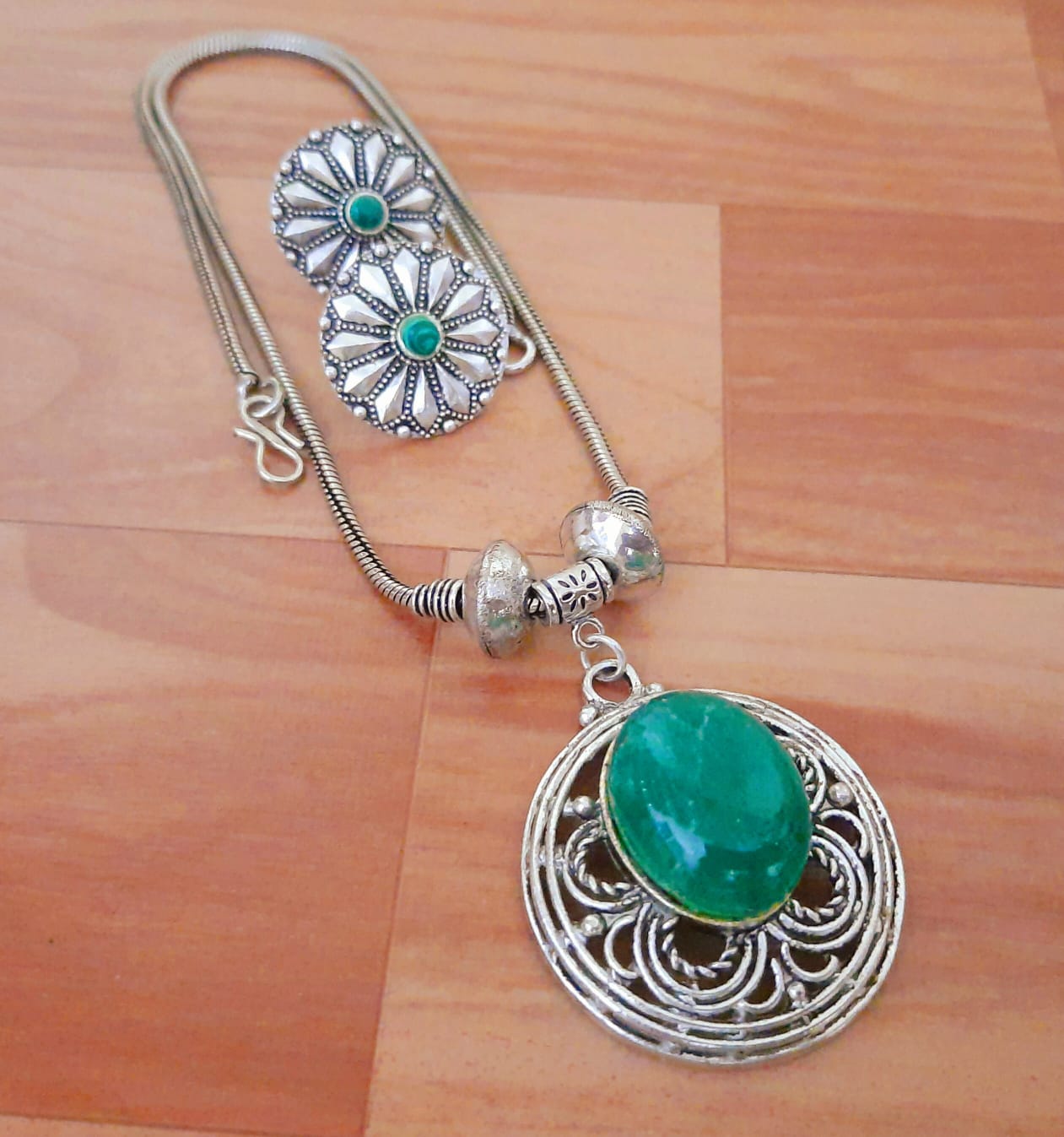 Ornate Silver Pendant Set with Gemstone