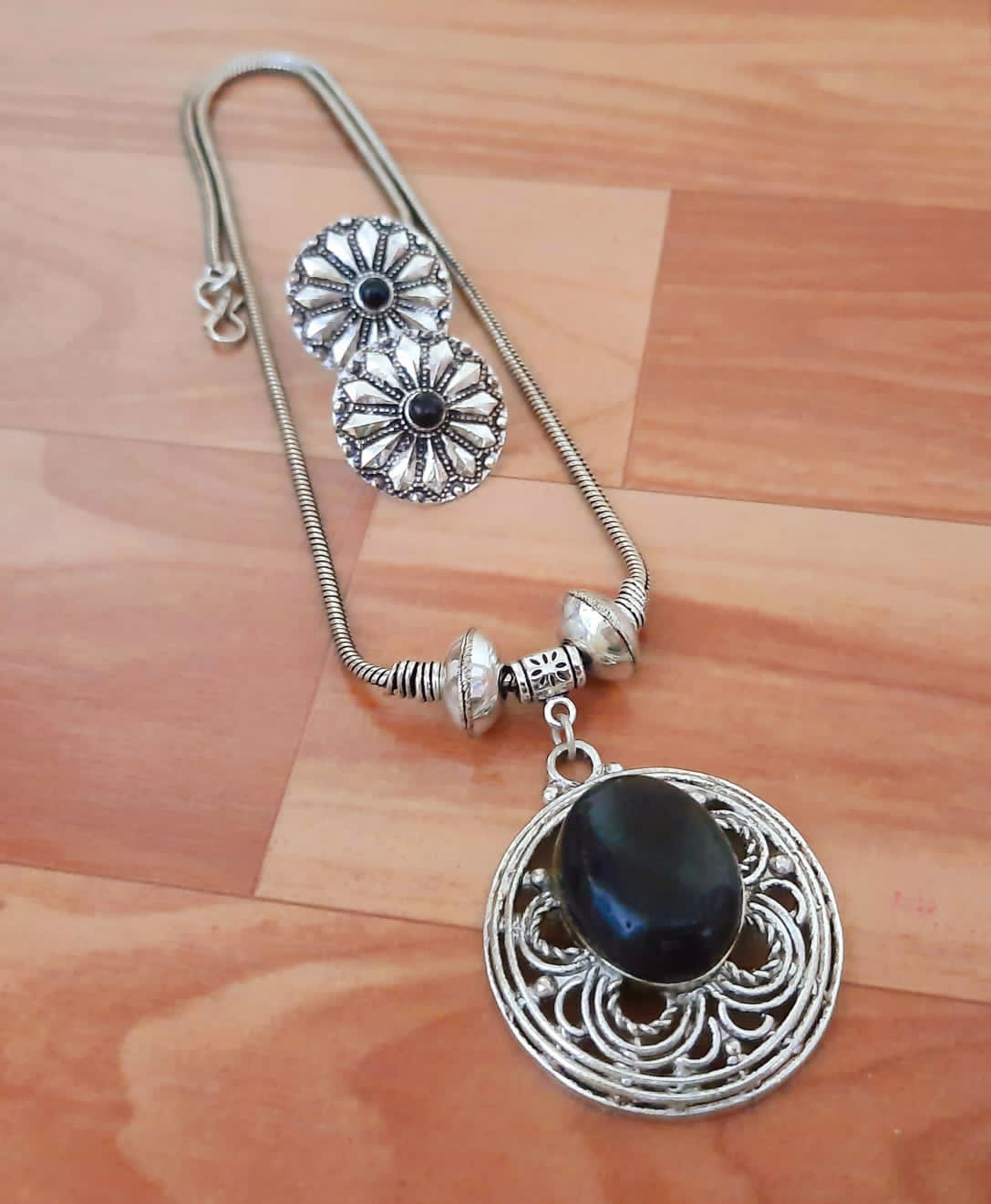 Ornate Silver Pendant Set with Gemstone
